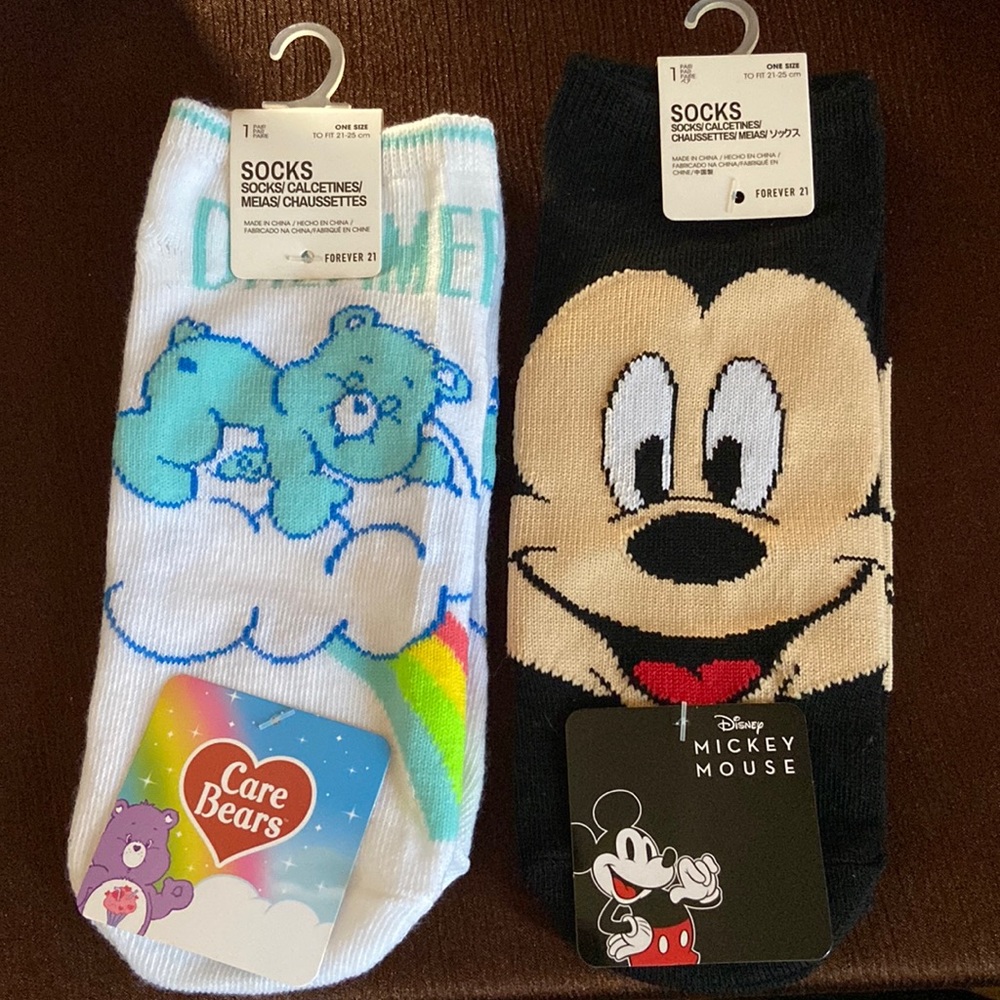 2 pair of socks Mickey Mouse  and Care Bears